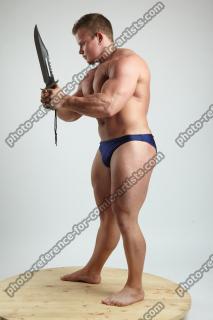 ADAM_WARD STANDING WITH KNIFE